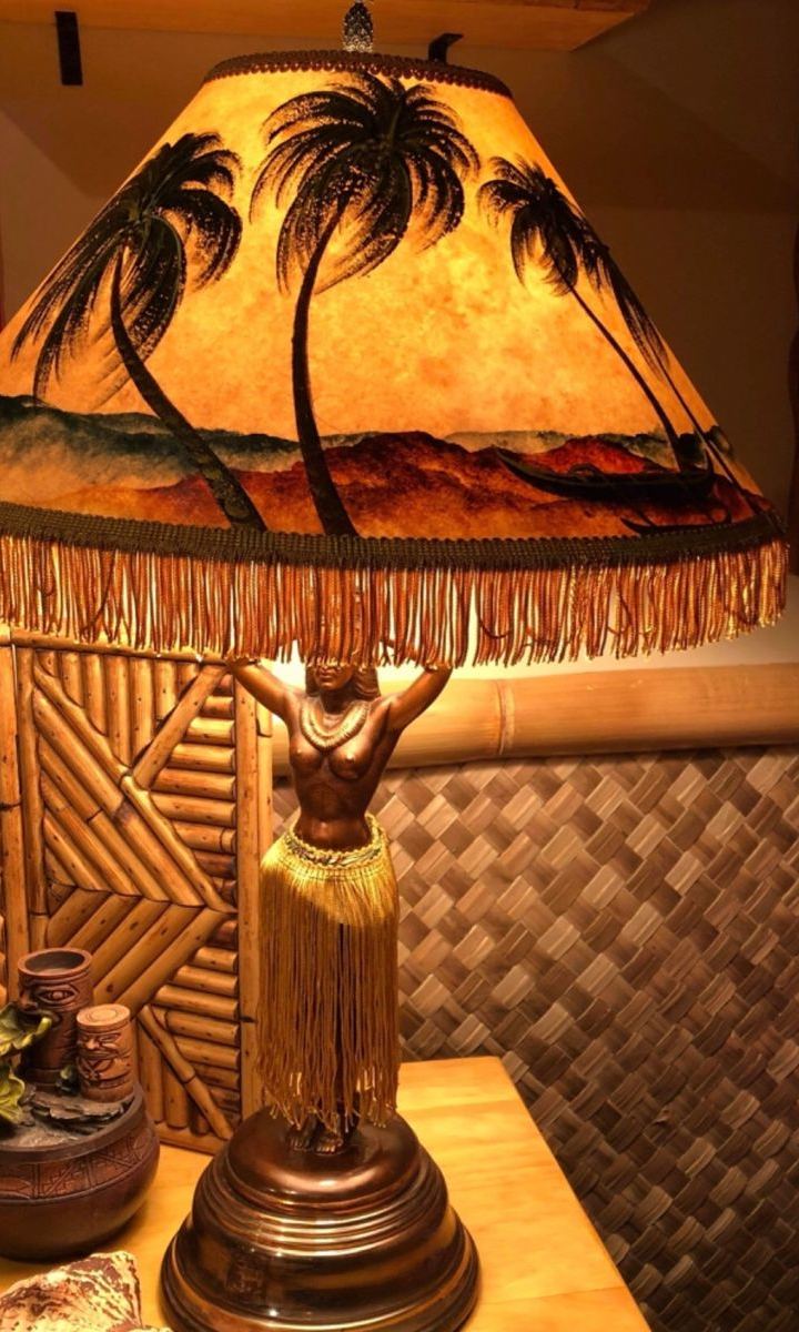 tiki lamp — warm glow, bamboo walls by Din Tanovic, Stockholm photo blog
