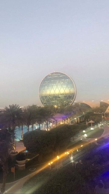 aldar — a coin balanced on its edge at dusk. by Din Tanovic, Stockholm photo blog