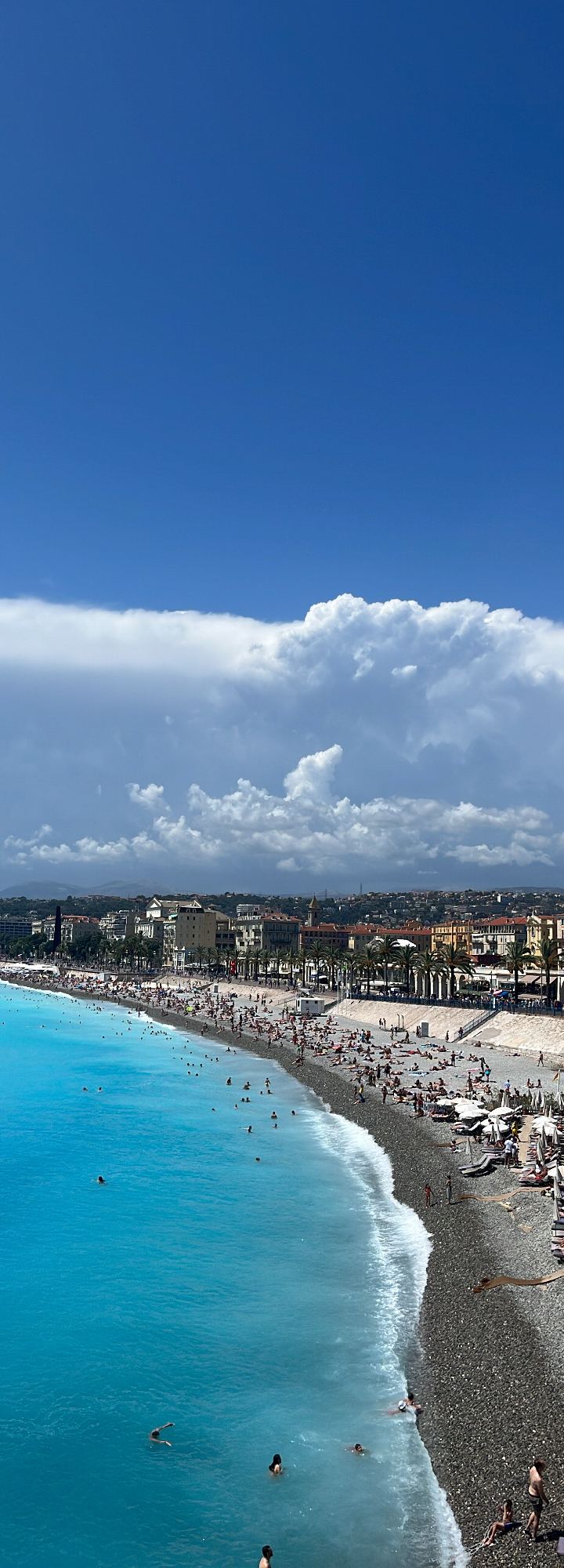 nice · promenade from above — turquoise sea, stacked clouds by Din Tanovic, Stockholm photo blog
