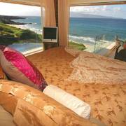 ocean morning — golden bedding, open sea.