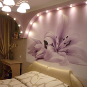 lily room — purple lilies and warm light.