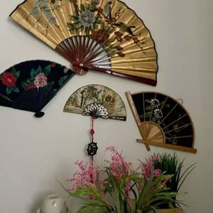 painted fans — wall of hand-painted fans — photo by Din Tanovic, Stockholm