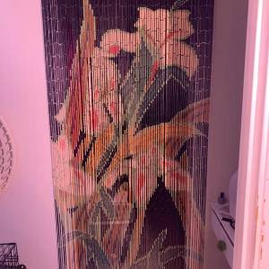 bead curtain — pink room, painted lilies — photo by Din Tanovic, Stockholm